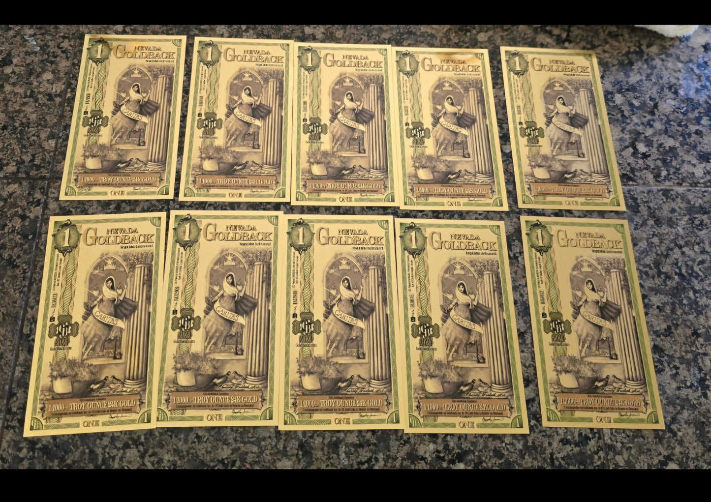 Lot of ten (10) Goldback foil notes with 1/1000 oz of .999 Gold per note